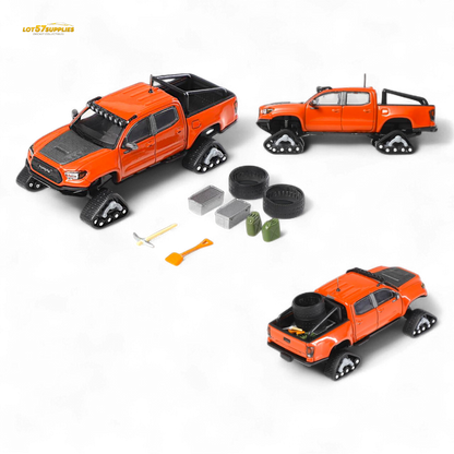 Diecast Toyota Tacoma with orange red GCD 3PMSF tires, 1:64 scale model from Lot57Supplies Diecast Shop, detailed vehicle replica.