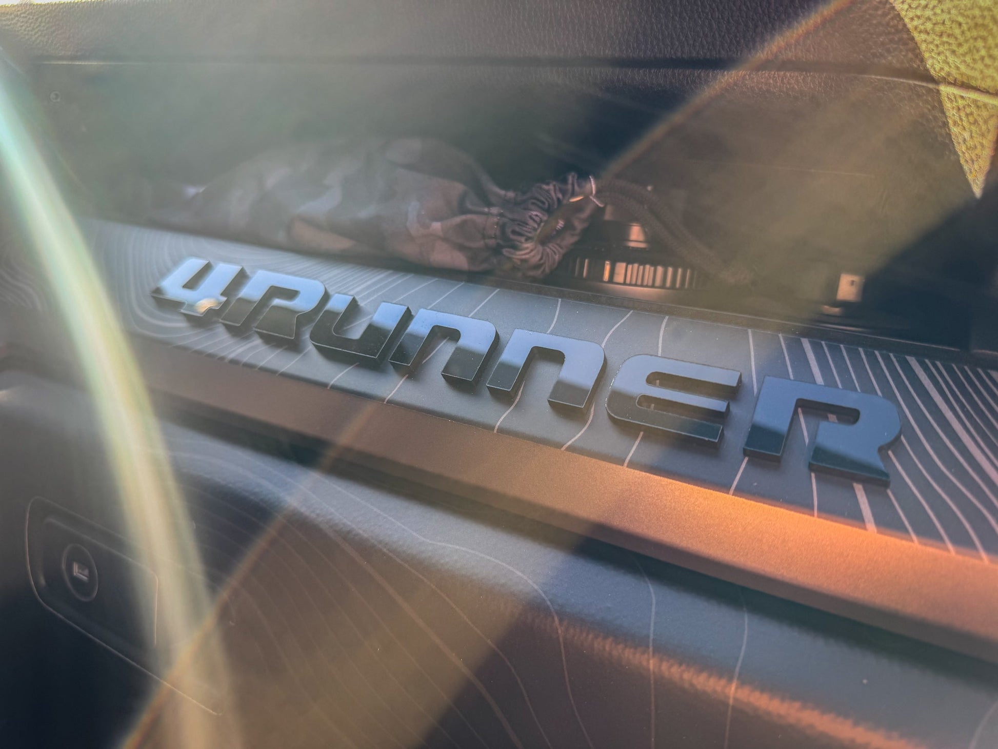 Vinyl "4RUNNER" dash letters with template for 2025+ Toyota 4Runner interior decor, shown on a white background.