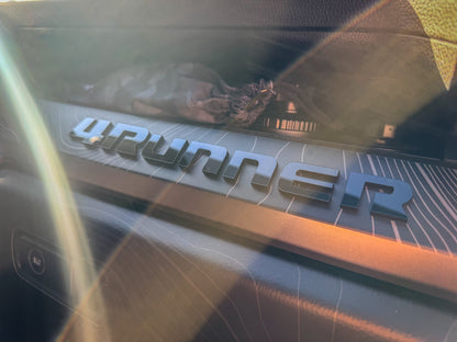 Vinyl "4RUNNER" dash letters with template for 2025+ Toyota 4Runner interior decor, shown on a white background.
