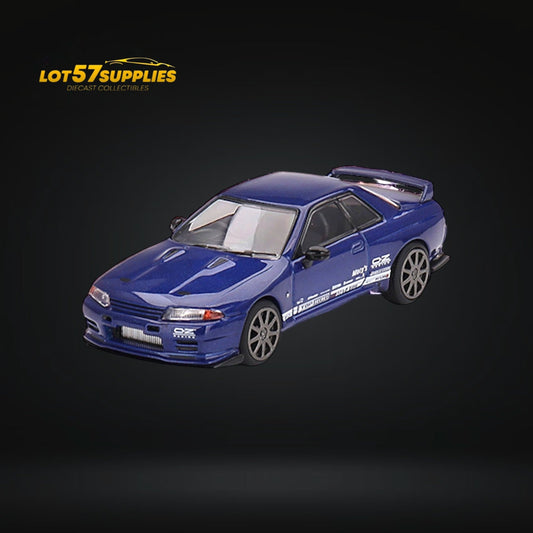 Mini-GT Nissan Skyline GT-R R32 diecast model in metallic blue, 1:64 scale, showcasing detailed design and realistic features.