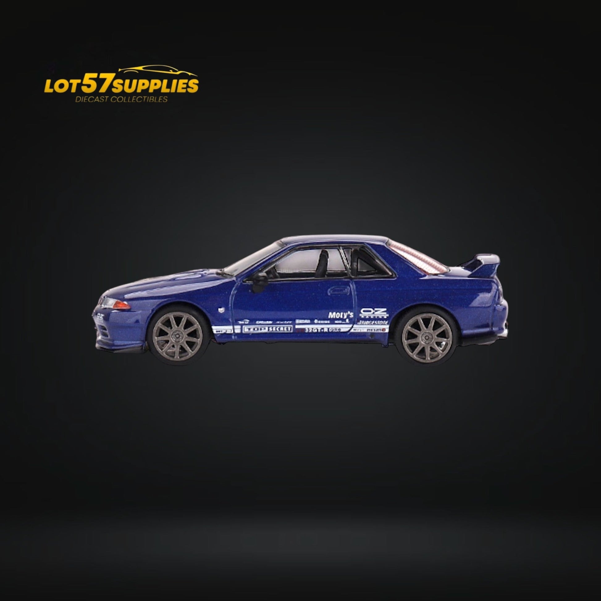 Mini-GT Nissan Skyline GT-R R32 diecast model in metallic blue, 1:64 scale, detailed Nissan collectible from Lot57Supplies Diecast Shop