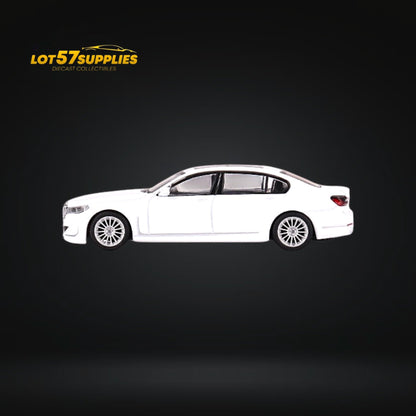 Mini GT BMW Alpina B7 xDrive diecast model in Alpine White, 1:64 scale, detailed BMW luxury car collectible.