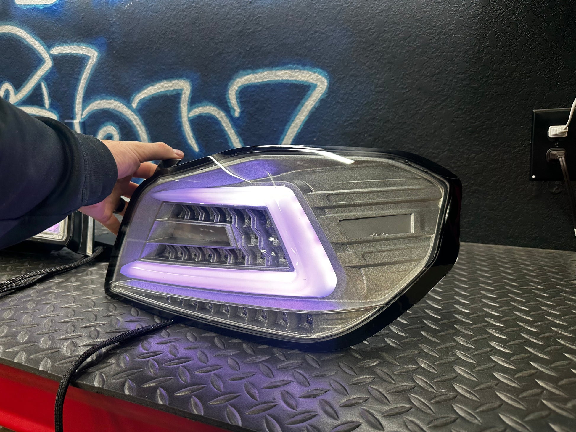 NTXGlow clear RGB color-shifting tail lights for 2015-2021 Subaru WRX/STI, showing illuminated multi-color tail light design.