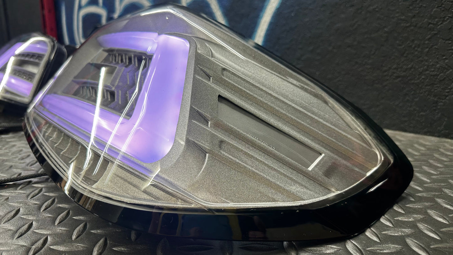 NTXGlow clear RGB color-shifting tail lights for 2015-2021 Subaru WRX and STI, shown installed on the vehicle.