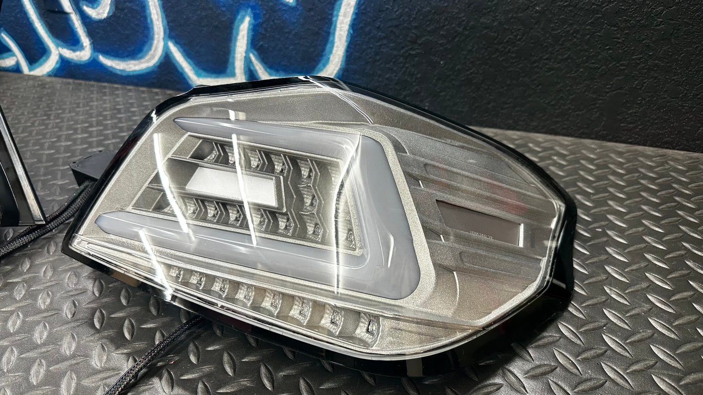 NTXGlow clear RGB color-shifting tail lights for 2015-2021 Subaru WRX/STI, featuring vibrant LED illumination and sleek design.