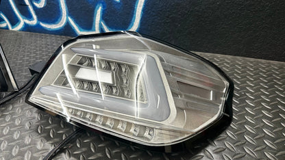 NTXGlow clear RGB color-shifting tail lights for 2015-2021 Subaru WRX/STI, featuring vibrant LED illumination and sleek design.