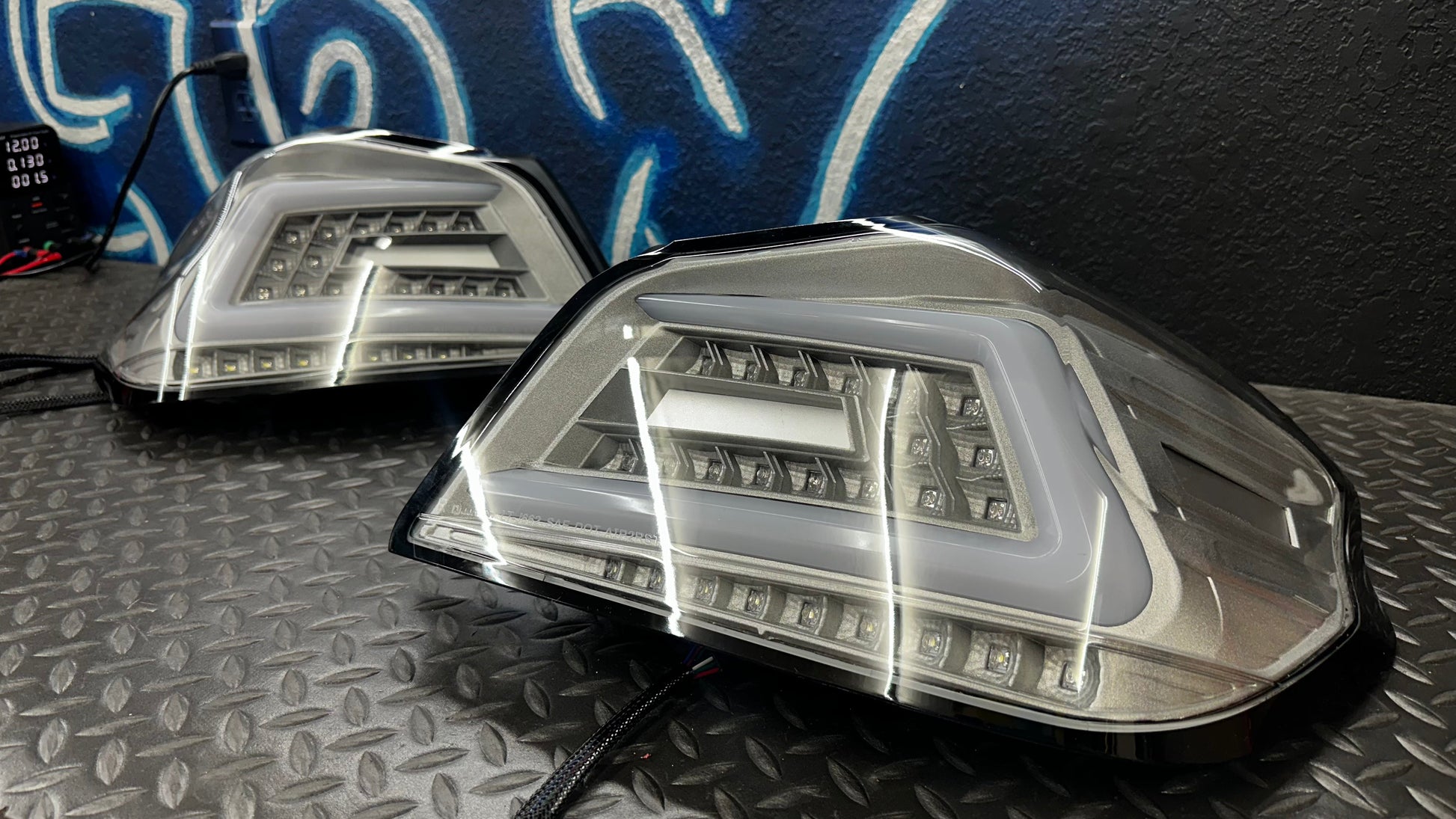 NTXGlow clear RGB color-shifting tail lights installed on 2015-2021 Subaru WRX/STI, showcasing vibrant lighting effects.