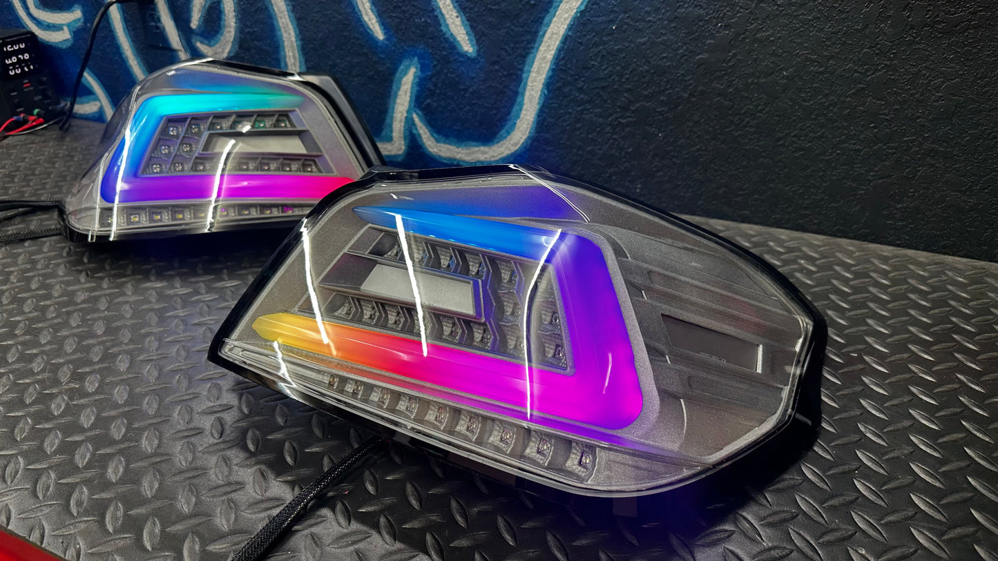 NTXGlow clear RGB color-shifting tail lights for 2015-2021 Subaru WRX/STI, featuring sleek design and vibrant lighting.