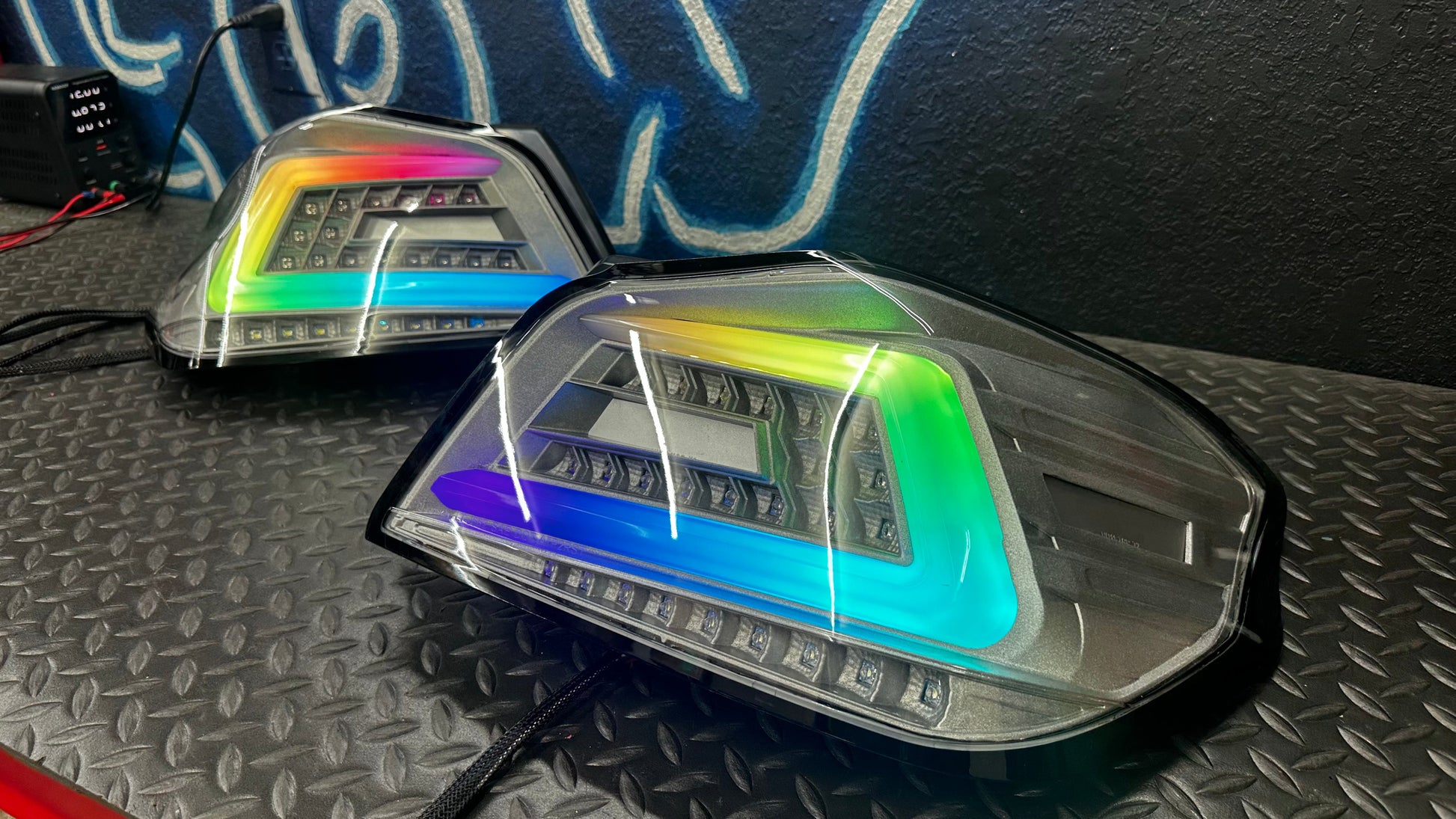 NTXGlow clear RGB color-shifting tail lights for 2015-2021 Subaru WRX and STI, featuring sleek design and vibrant illumination.