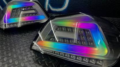 NTXGlow clear RGB color-shifting tail lights for 2015-2021 Subaru WRX and STI, showing the sleek design and vibrant lighting effects.
