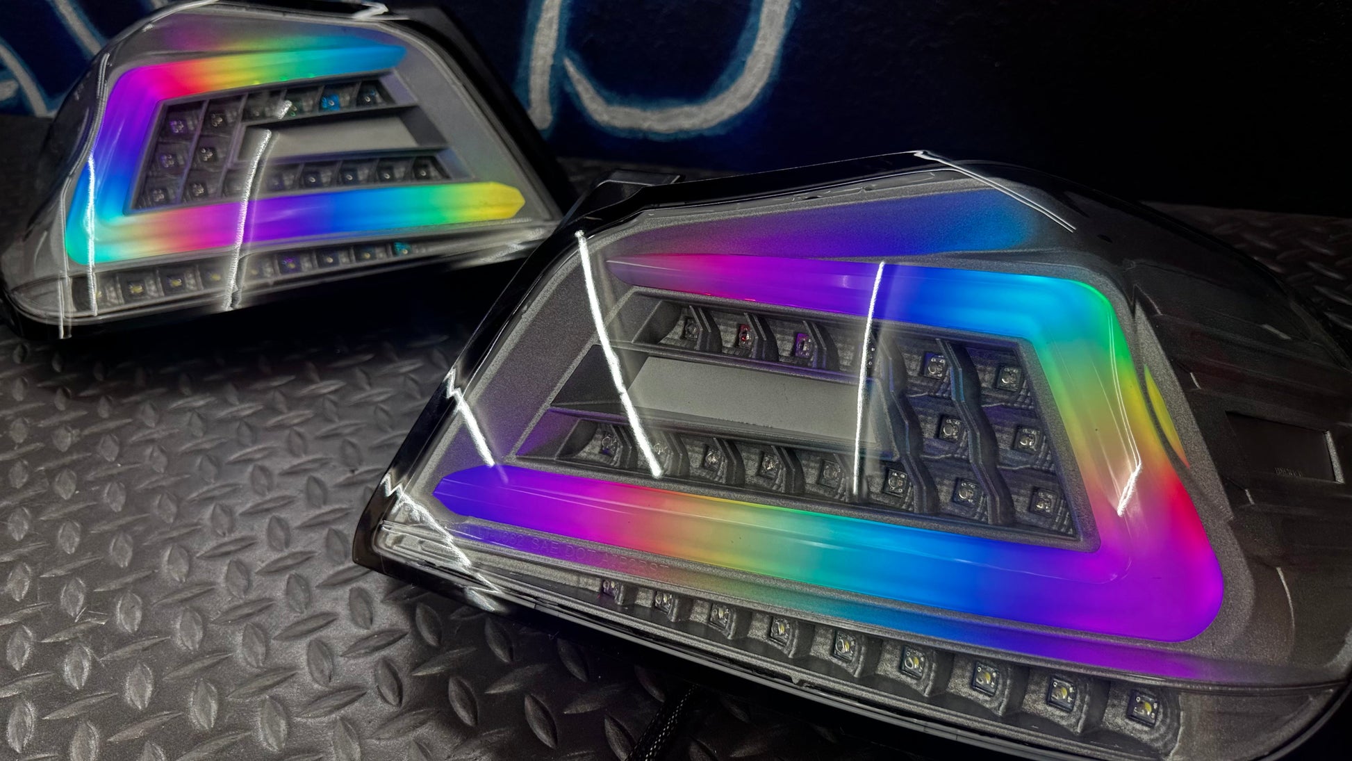 NTXGlow clear RGB color-shifting tail lights for 2015-2021 Subaru WRX and STI, featuring sleek design and vibrant lighting.