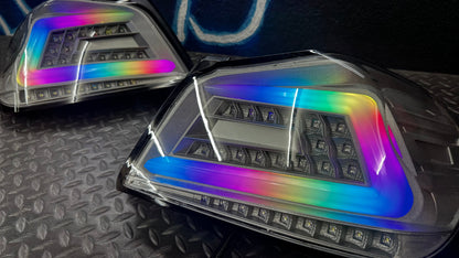 NTXGlow clear RGB color-shifting tail lights for 2015-2021 Subaru WRX and STI, shown installed on the vehicle.