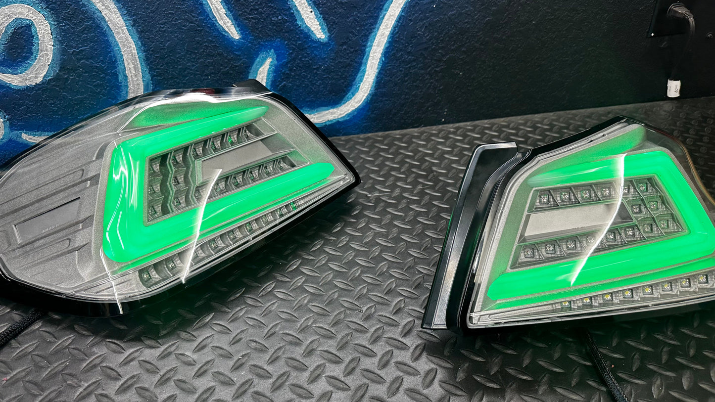 NTXGlow clear RGB color-shifting tail lights for 2015-2021 Subaru WRX and STI, featuring vibrant LED illumination and sleek design.