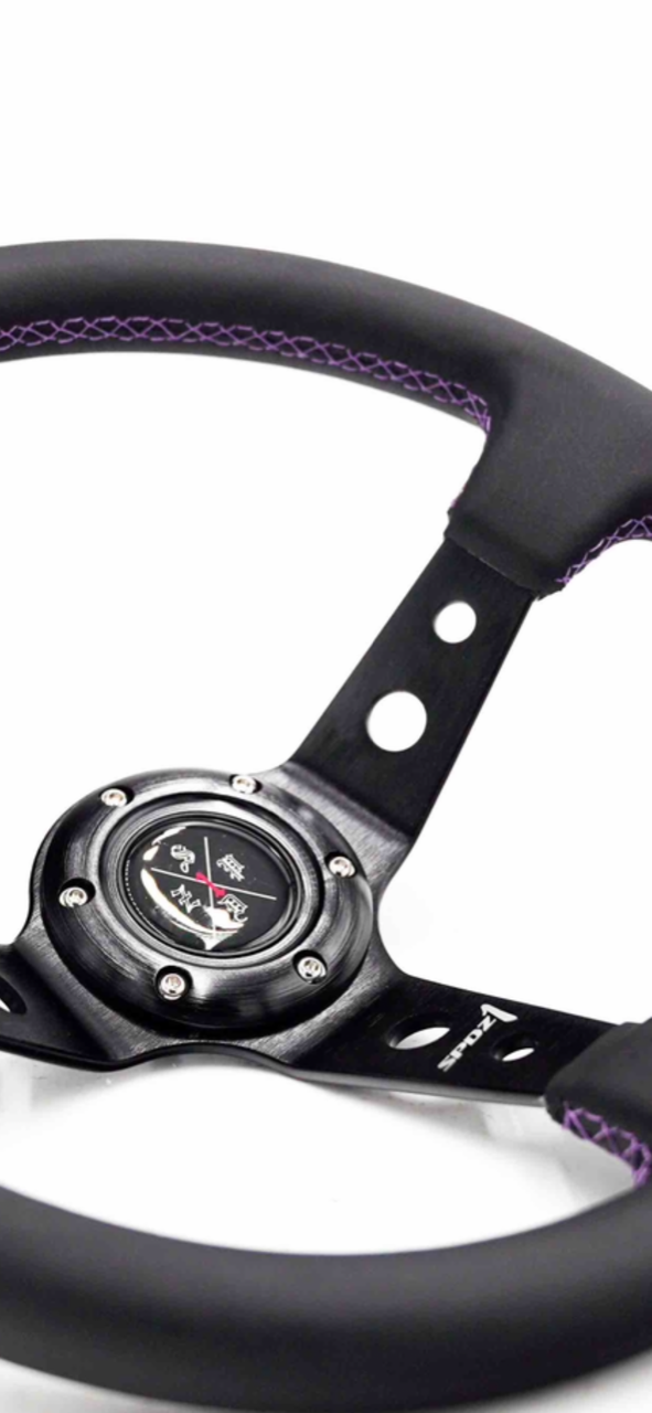 Purple lined steering wheel by Speedzone Performance LLC, featuring a sleek design and ergonomic grip for enhanced driving control.