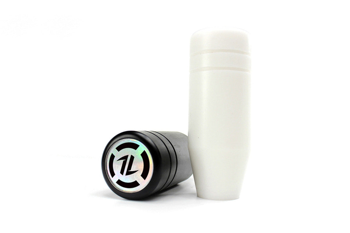 Black ISR Performance 100mm manual transmission shift knob by FR SPORT, showing its sleek, cylindrical shape and textured surface.