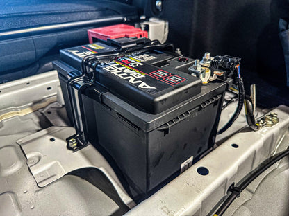 2023 GR Corolla Lithium Performance Battery by MeLe Design Firm, compact automotive battery with black casing and terminal connections.
