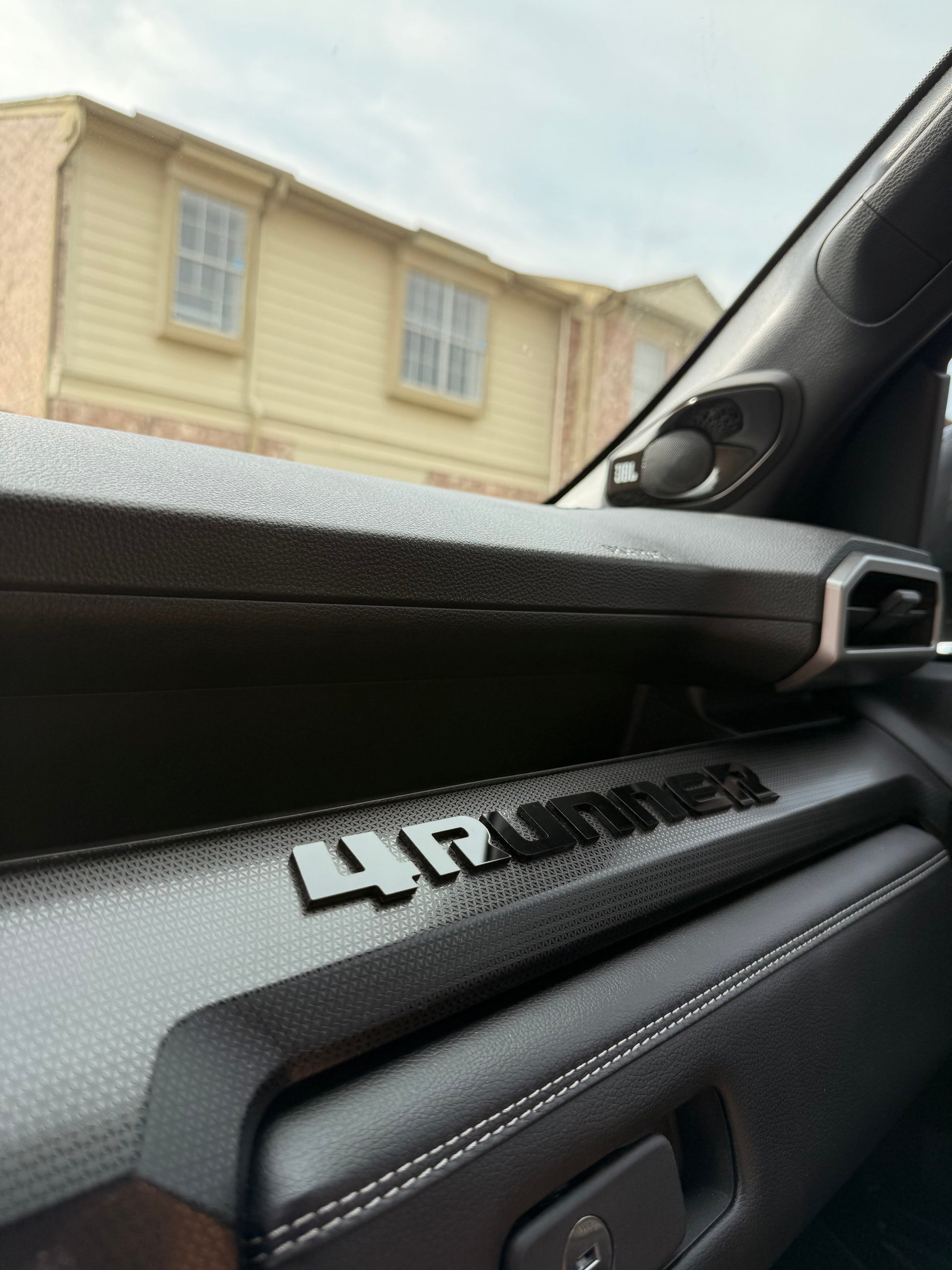 Black vinyl "4RUNNER" dash letters with template for 2025+ Toyota 4Runner interior customization by StickerFab.