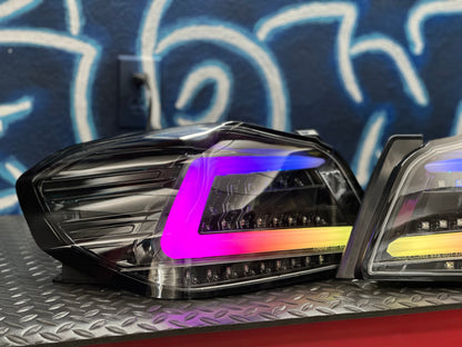 NTXGlow black RGB color-shifting tail lights for 2015-2021 Subaru WRX and STI, with Spec-D base, showcasing illuminated tail light design.