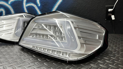 NTXGlow clear OEM+ sequential tail lights for 2015-2021 Subaru WRX/STI, featuring modern design and LED light strips.