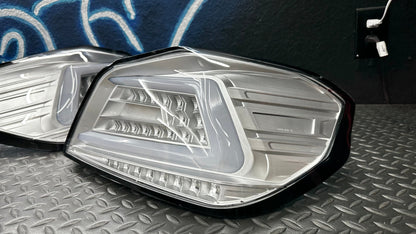 NTXGlow clear OEM+ sequential tail lights for 2015-2021 Subaru WRX/STI, featuring modern design and LED illumination.
