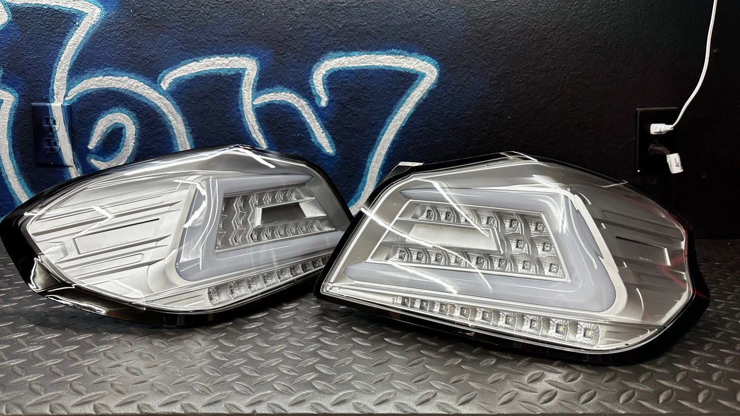NTXGlow clear OEM+ sequential tail lights for 2015-2021 Subaru WRX and STI, featuring modern design and LED illumination.