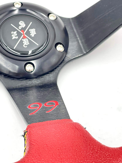 Red SPDZ1 “The Dragon” steering wheel by Speedzone Performance LLC, showcasing its intricate dragon design and sporty grip.