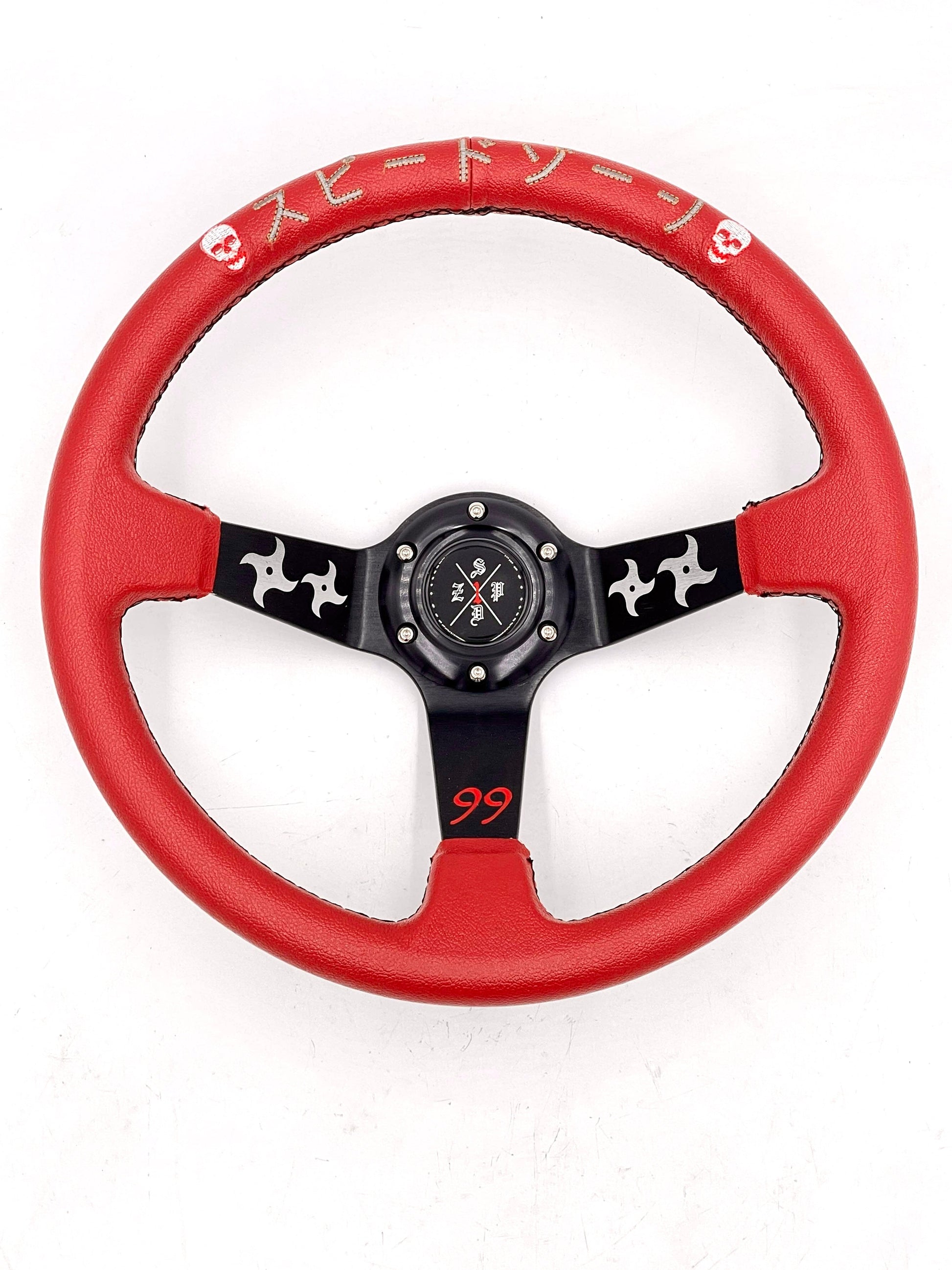 Red SPDZ1 “The Ninja” deep dish steering wheel by Speedzone Performance LLC, showing its sleek design and ergonomic grip.