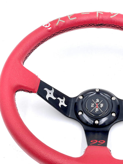 Red SPDZ1 “The Ninja” deep dish steering wheel by Speedzone Performance LLC, with a sleek, ergonomic design for racing vehicles.