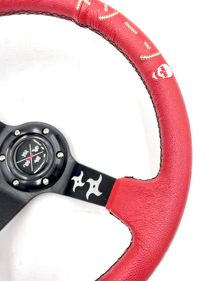 Red SPDZ1 “The Ninja” deep dish steering wheel by Speedzone Performance LLC with a sleek, ergonomic design for racing or street use.