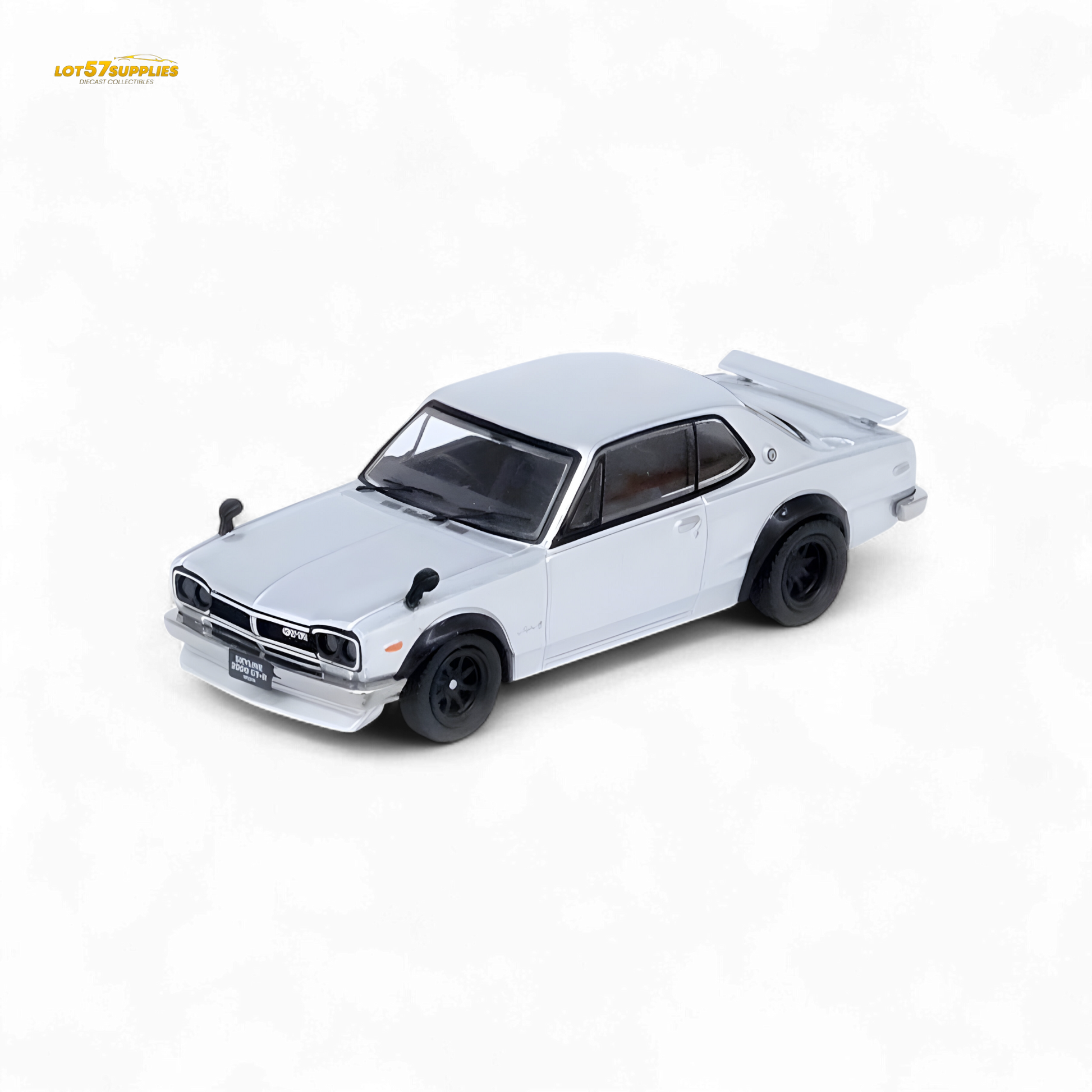 Silver Inno64 Nissan Skyline 2000GT-R (KPGC10) diecast model car, detailed miniature with realistic features.