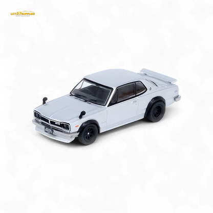 Silver Inno64 Nissan Skyline 2000GT-R (KPGC10) diecast model car, detailed miniature with realistic features.