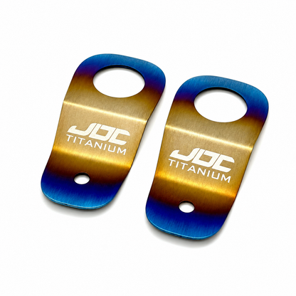 Titanium radiator stay bracket for Honda S2000, EK, EM, and EJ models by JD Customs U.S.A, showing the lightweight, durable design.