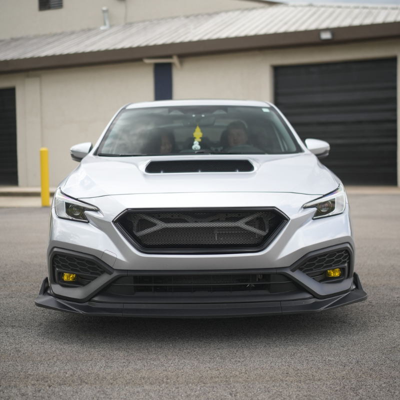 JDMuscle front bumper grille for 2022-2025 Subaru WRX, CS Style V1, paint-matched and gloss black finish, showcasing sleek automotive design.