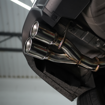 JDMuscle 22-25 Subaru WRX VB 4-inch quad exit axle back muffler delete exhaust installed on car with visible exhaust tips