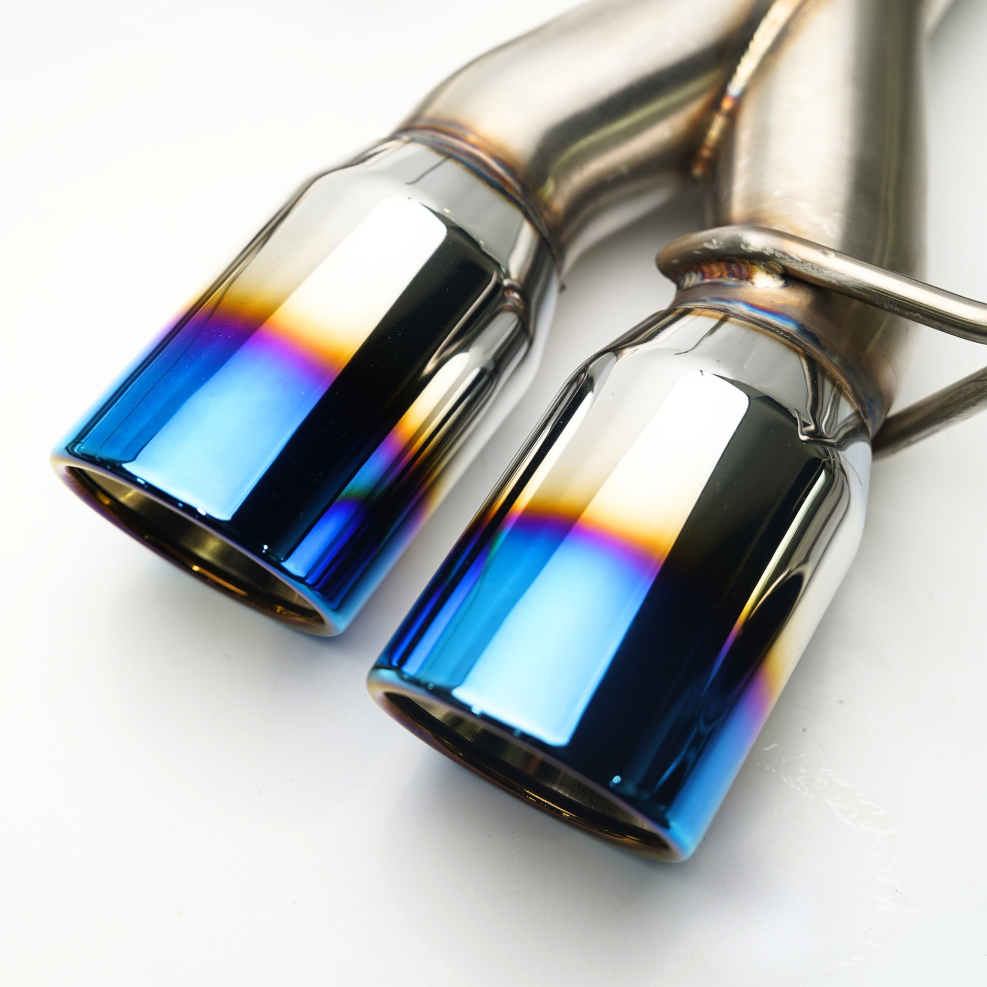 JDMuscle 22-25 WRX VB quad exit axle back exhaust system with muffler delete and four chrome tips, mounted on Subaru WRX.