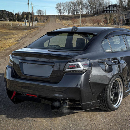 Black housing NTXGlow Spec-D LED tail lights for 2015-2021 Subaru WRX and STI, featuring sleek design and bright illumination.
