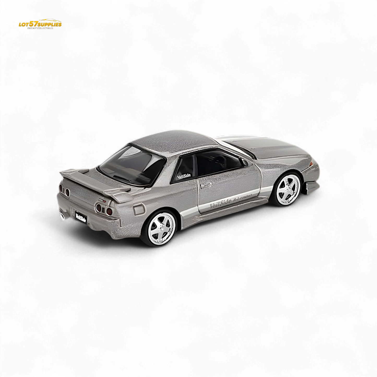 Mini GT Nissan Skyline GT-R R32 Veilside Combat grey diecast model, 1:64 scale, showcasing detailed design and vibrant paint.