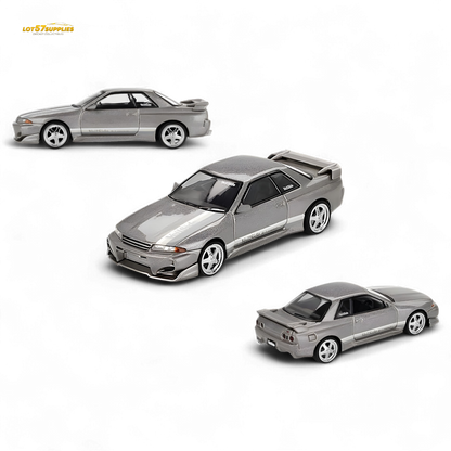 Mini GT Nissan Skyline GT-R R32 Veilside Combat grey diecast model in 1:64 scale, detailed view of the collectible toy car.