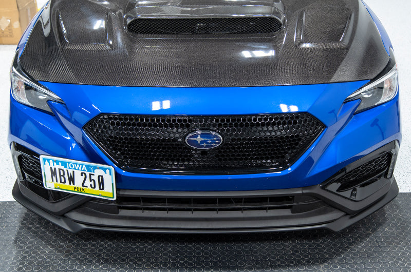 OLM S Style matte black front lip for 2022+ Subaru WRX, showcasing a sleek aerodynamic design for enhanced sporty appearance.