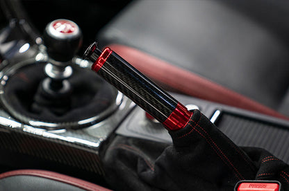 OLM Signature Series E-Brake Handle in red and black carbon for BRZ, WRX, and STI