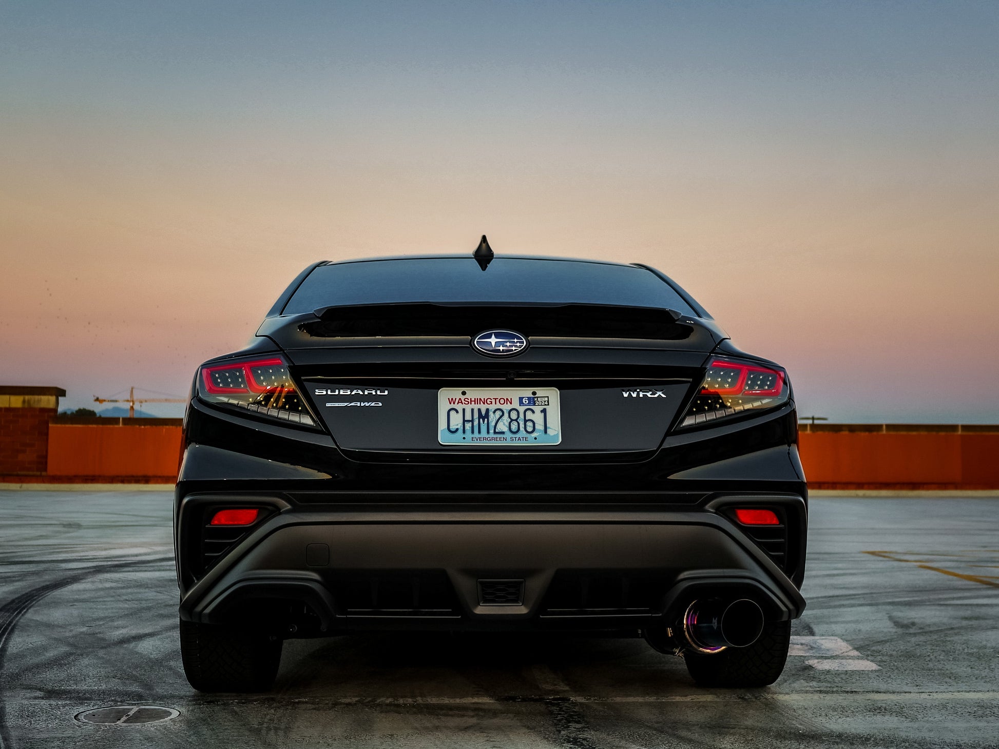 OLM Spec-AR LED taillights for 2022+ Subaru WRX, clear lens with black base and red bar, showing the sleek tail light design.