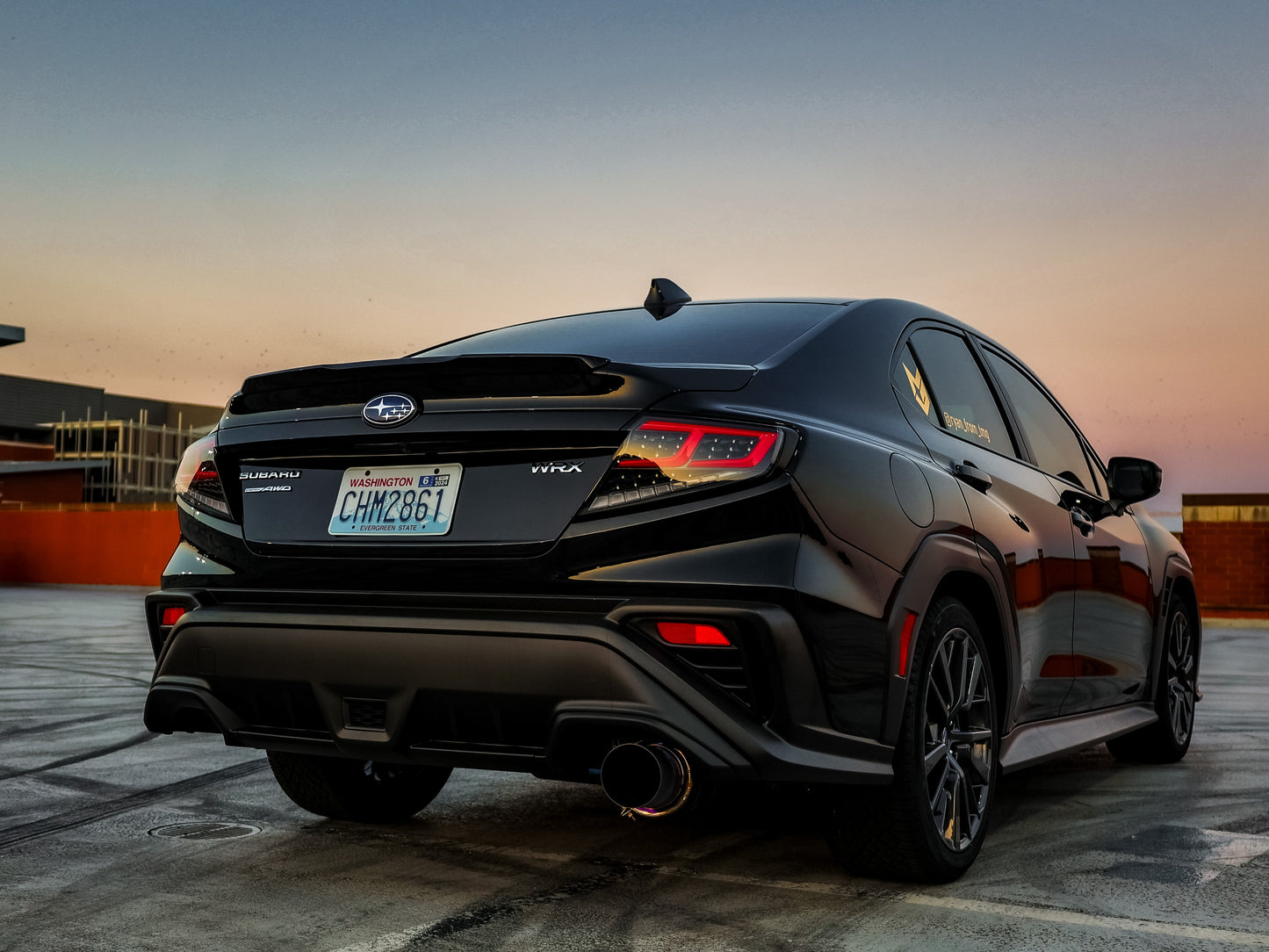 OLM Spec-AR LED taillights for 2022+ Subaru WRX, clear lens with black base and red bar, showing the tail light design and installation.