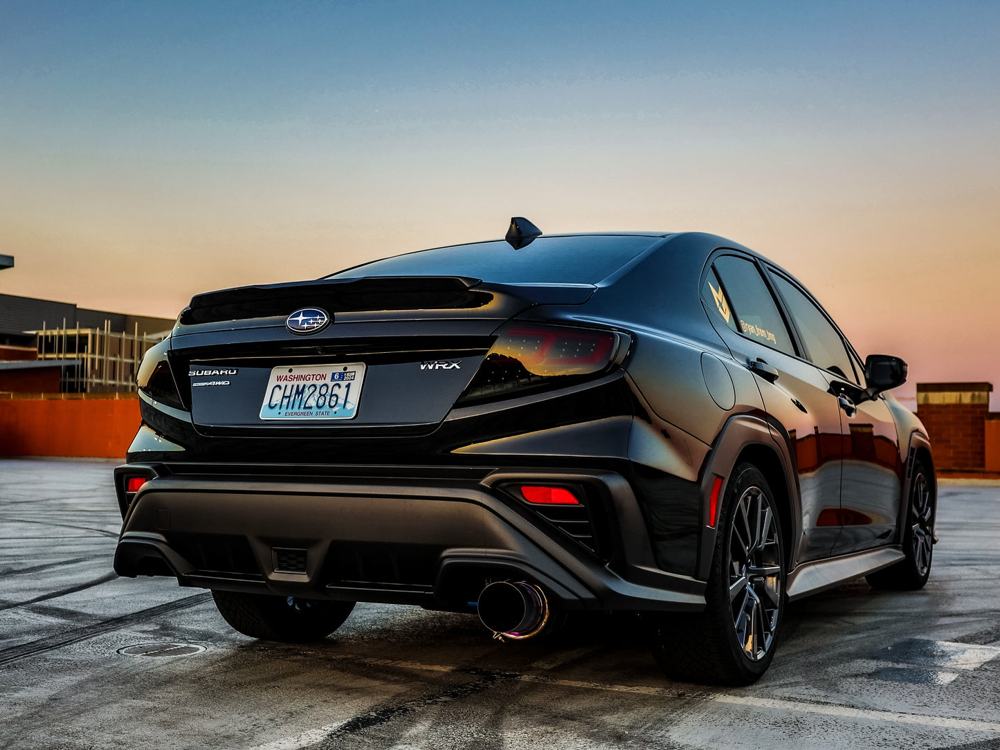 OLM Spec-AR LED taillights with smoke lens, black base, and red bar for 2022+ Subaru WRX, showing the sleek tail light design.