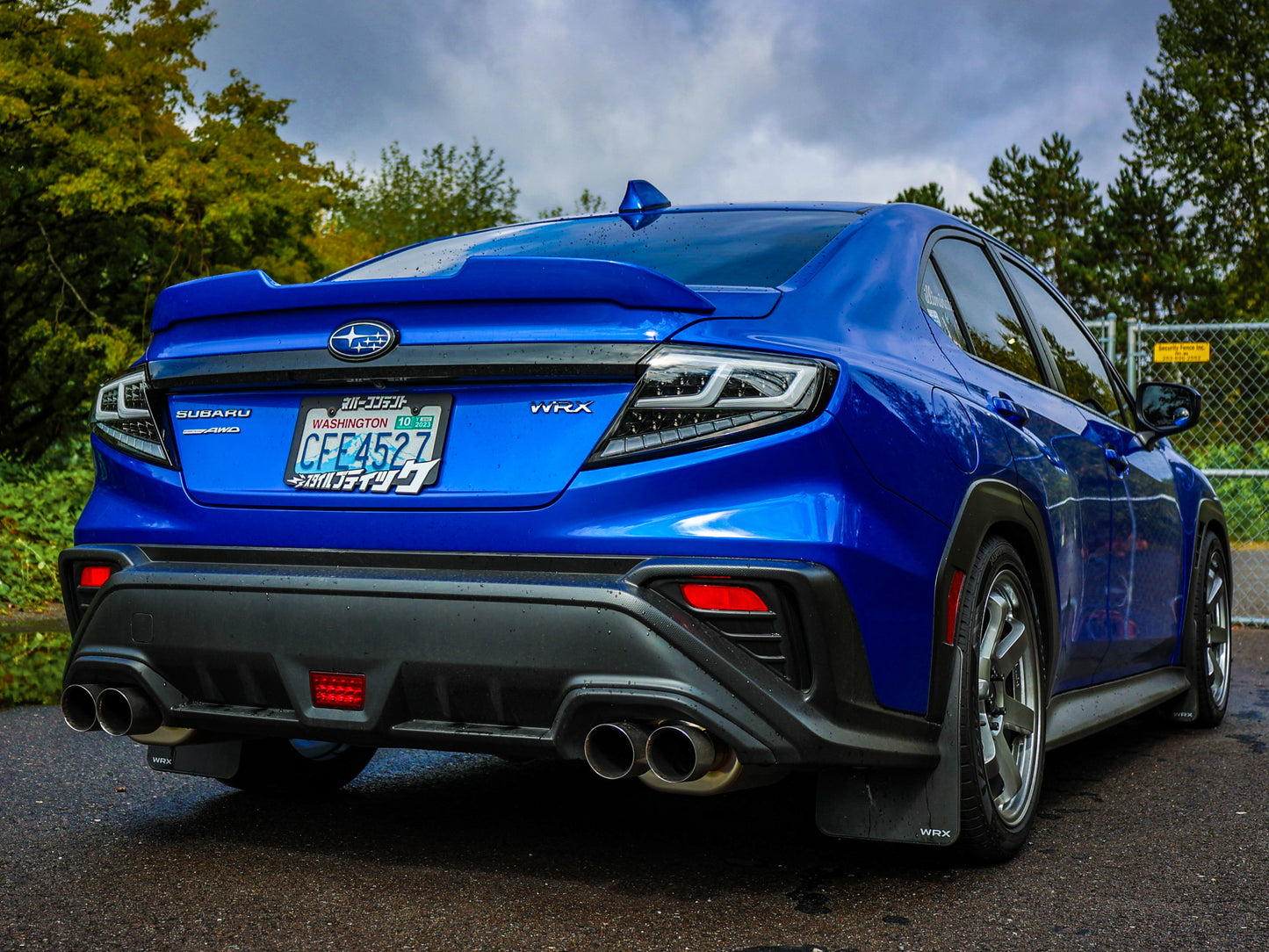 OLM Spec-AR LED taillights with clear lens, black base, and white bar installed on 2022+ Subaru WRX.