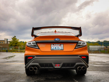 OLM Spec-AR LED taillights for 2022+ Subaru WRX, clear lens with black base and white bar, installed on the rear of the vehicle.