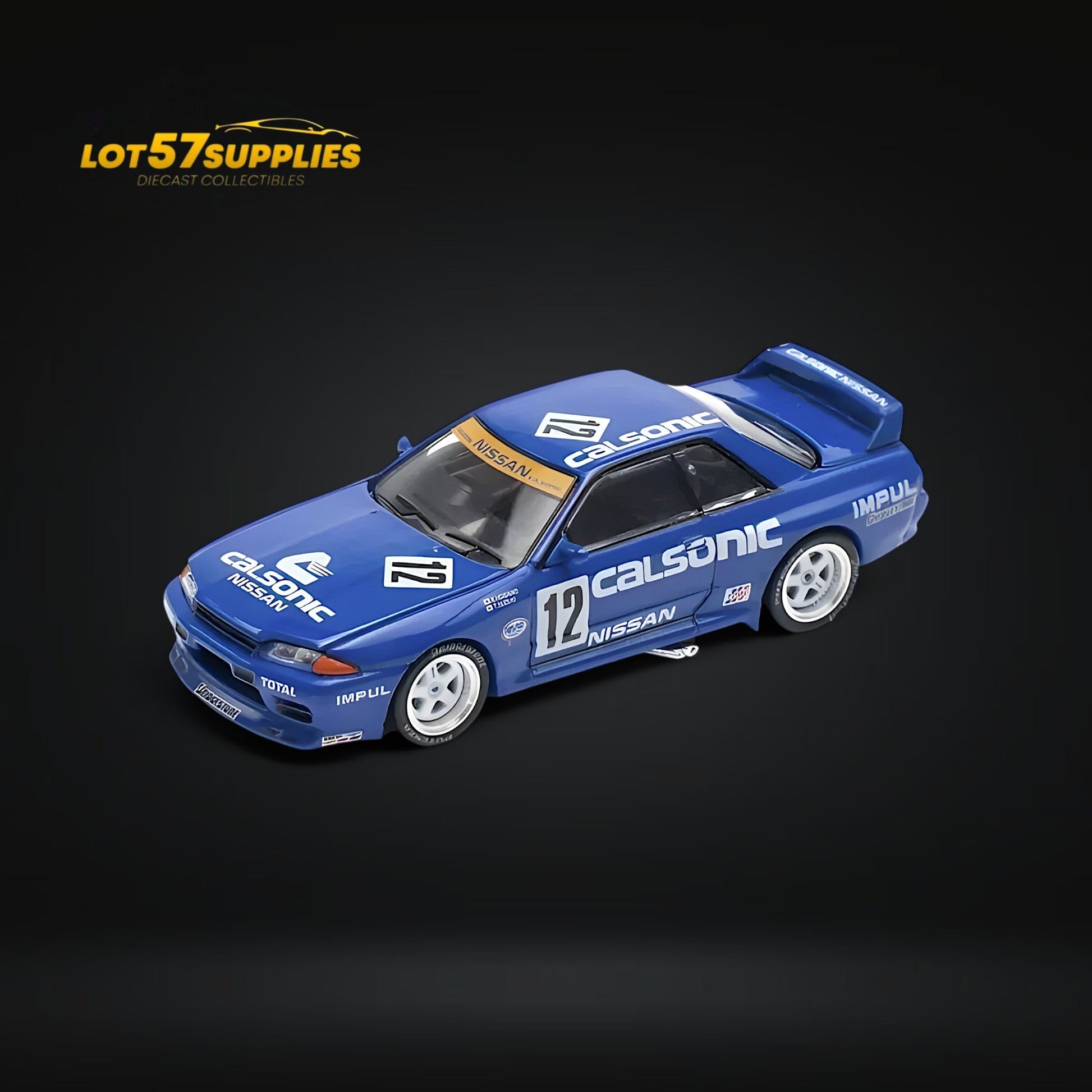 Detailed image of a 1:64 scale Nissan Skyline GT-R R32 JTC 1990 Calsonic diecast model in blue with racing decals.
