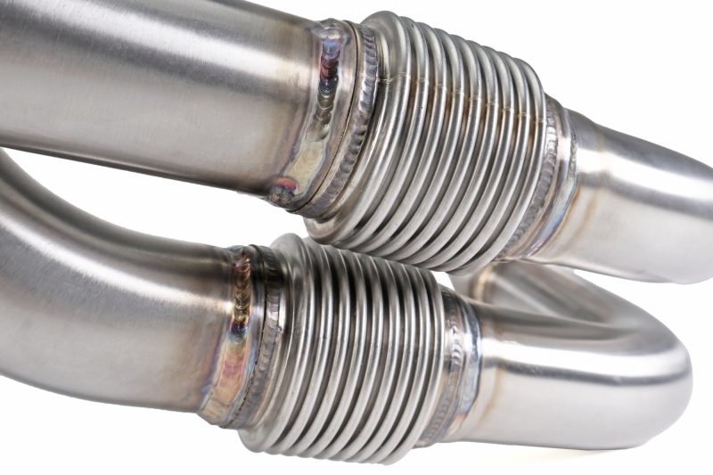 JDMuscle Perrin 19-25 WRX equal length brushed stainless steel exhaust headers and manifolds on engine bay.