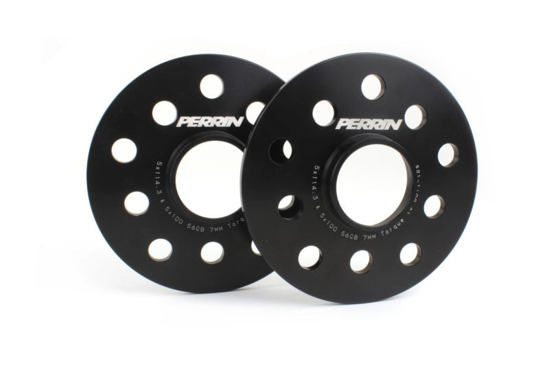Black PERRIN 7mm wheel spacers for Subaru WRX, STI, Outback, Legacy, and Forester, designed for improved fitment and stance.