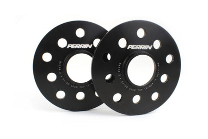 Black PERRIN 7mm wheel spacers for Subaru WRX, STI, Outback, Legacy, and Forester, designed for improved fitment and stance.