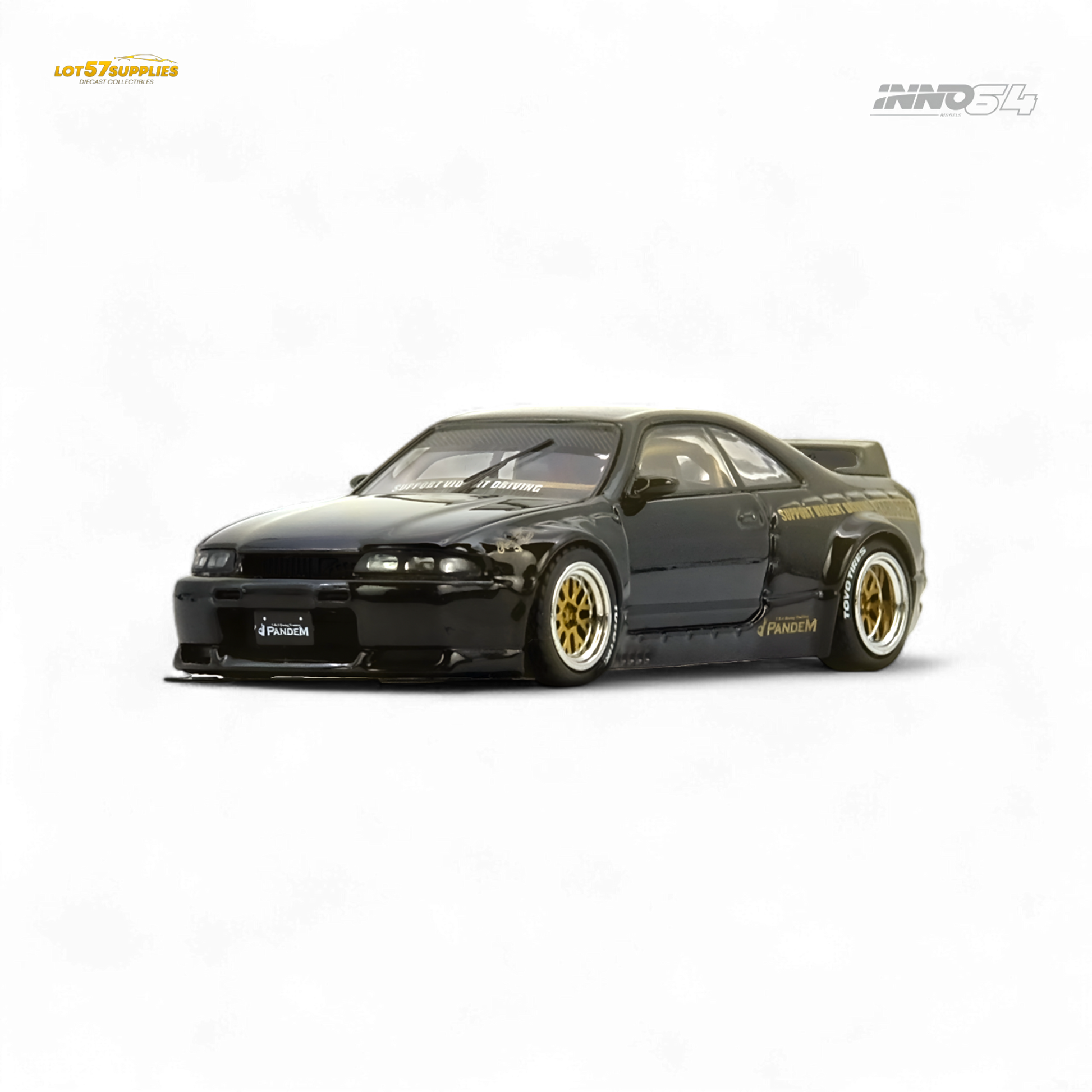 Black Inno64 PANDEM GT-R (BCNR33) diecast Nissan model in 1:64 scale, detailed silver and gold accents, realistic design.